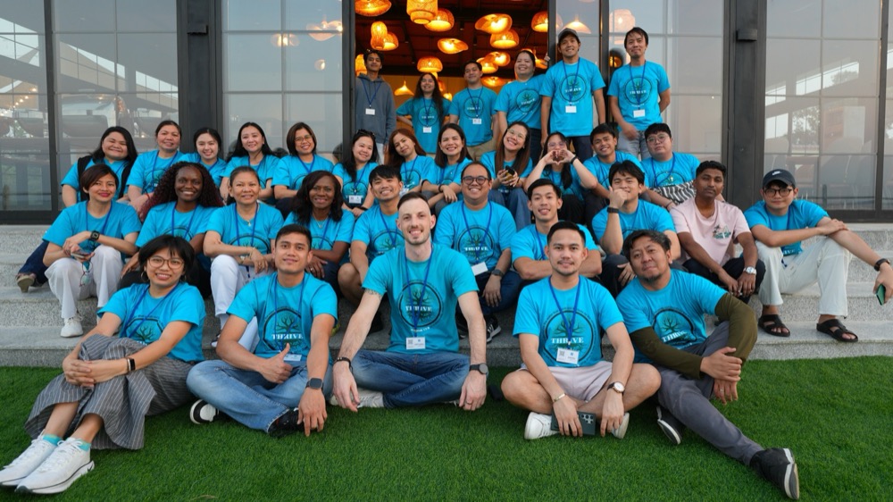 The Koinonia team in matching shirts, gathered together